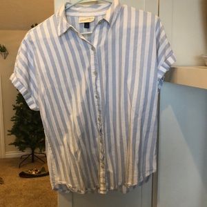 Cute button up top for women.